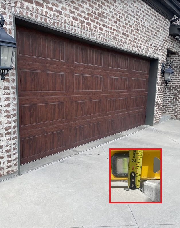 Sunken driveway apron before lifting