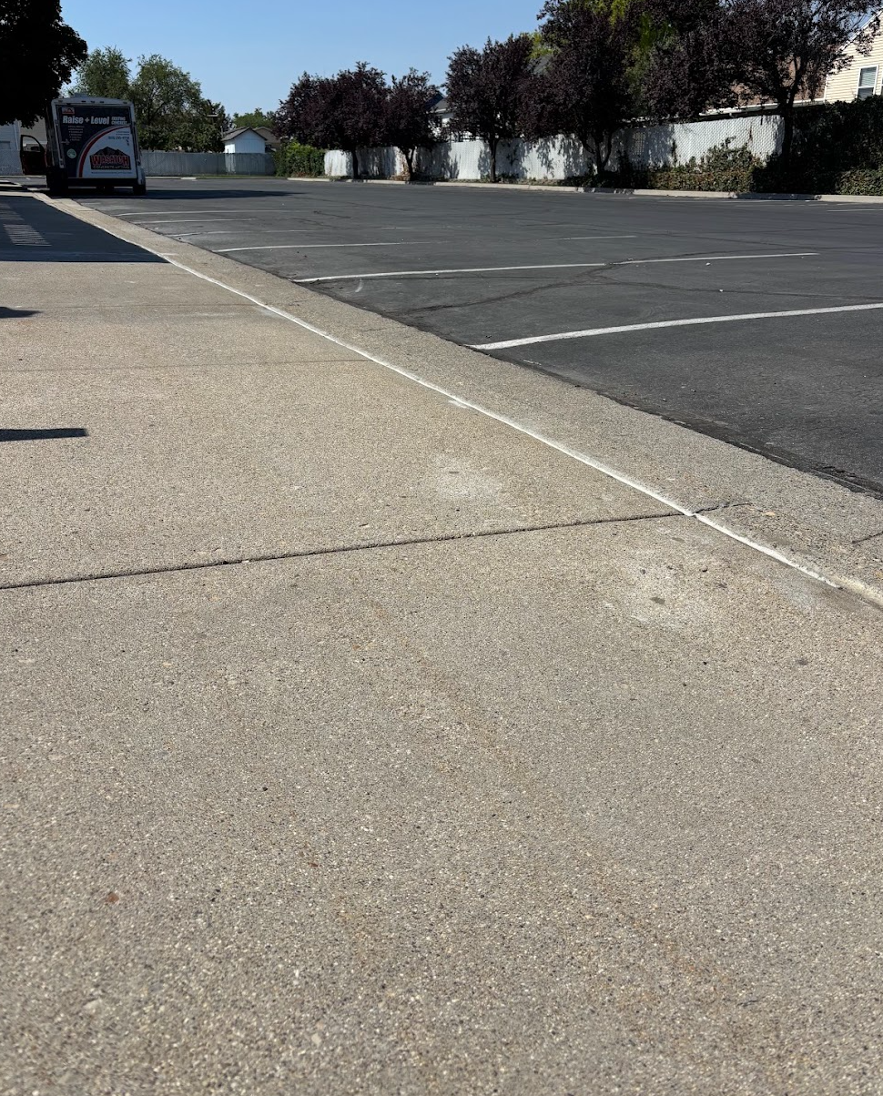 Level sidewalk and sealed curb joint in Park City after concrete lifting by Wasatch Concrete Lifting