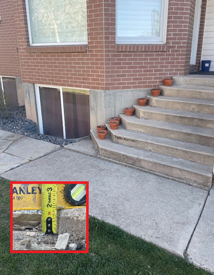 Sunken backyard patio before lifting