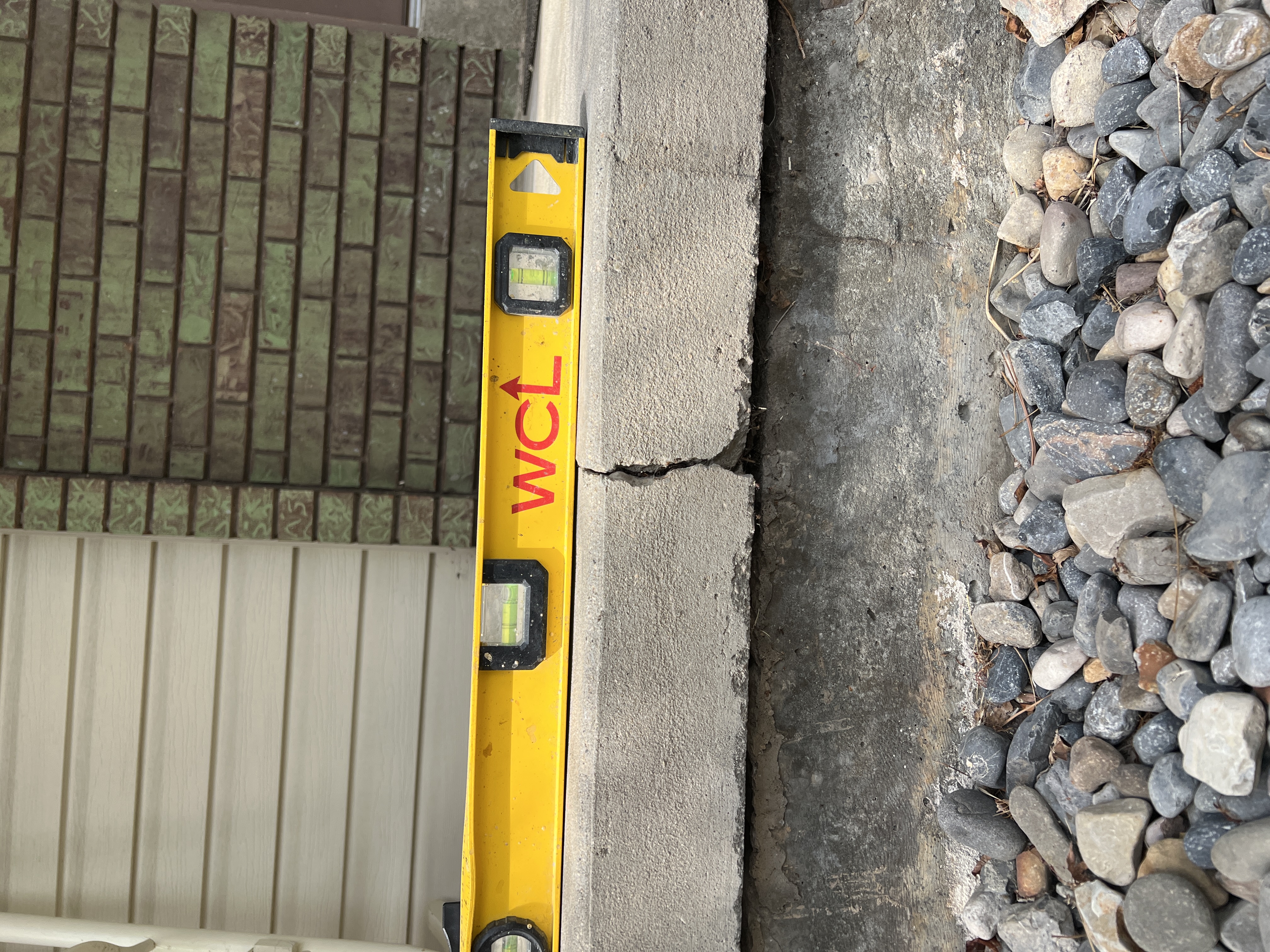 Level patio after concrete lifting by Wasatch Concrete Lifting