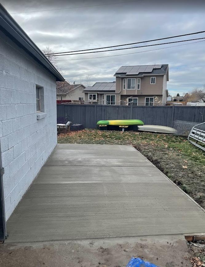 Fresh concrete sidewalk pour in Salt Lake City by Wasatch Concrete Lifting